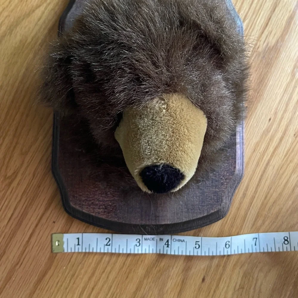 Plush mounted animal heads. Kids room - cabin  humor